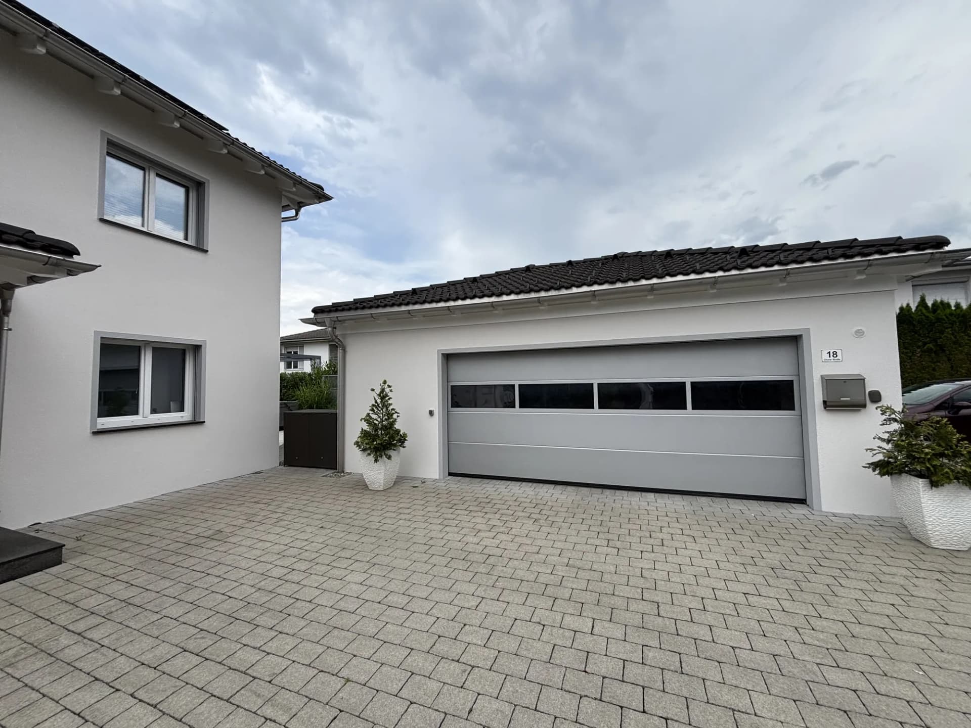Wohnhaus mit Garage – Projekt von Maler Falke