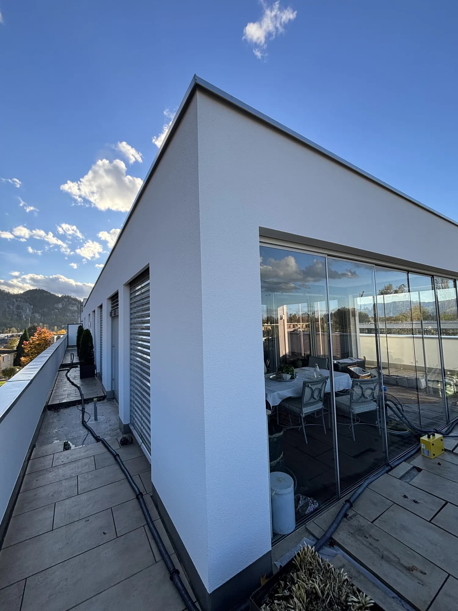 Dachterrasse mit Glasfront – Projekt von Maler Falke